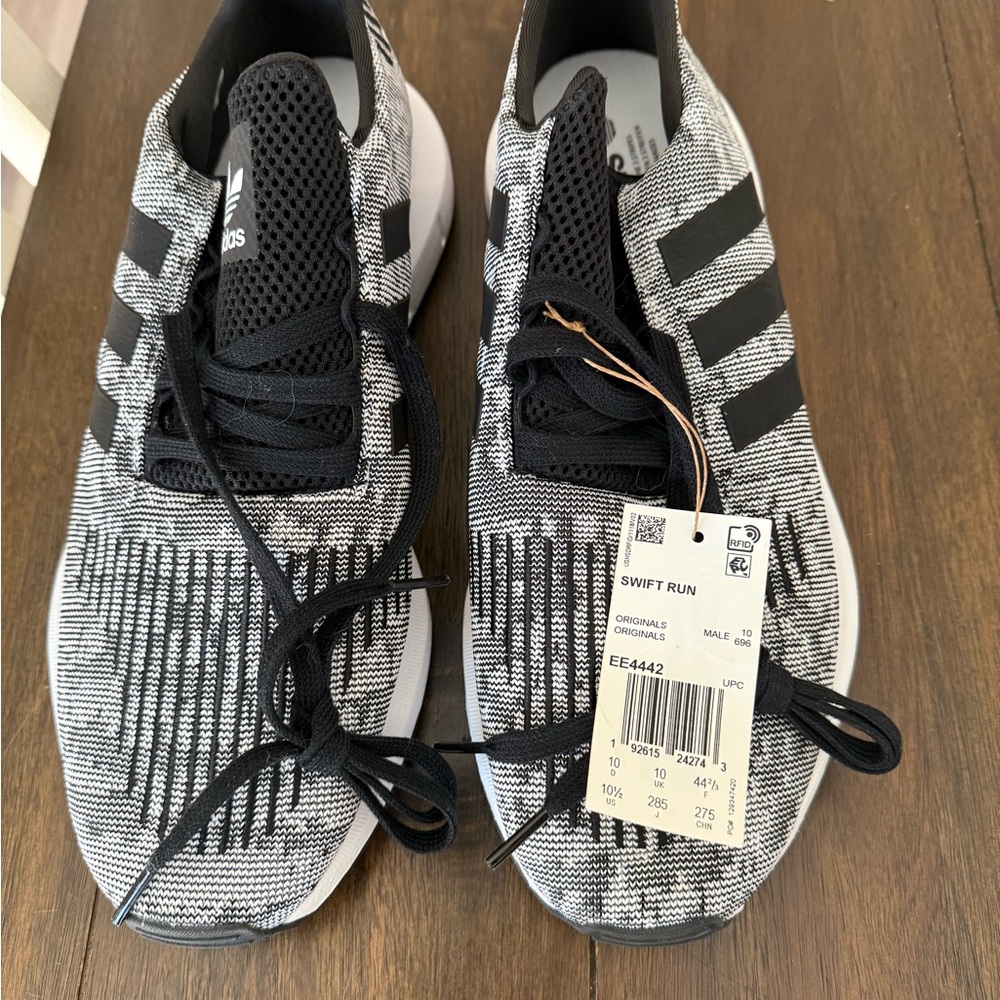 Adidas Black and White Sneakers with Graphic Print